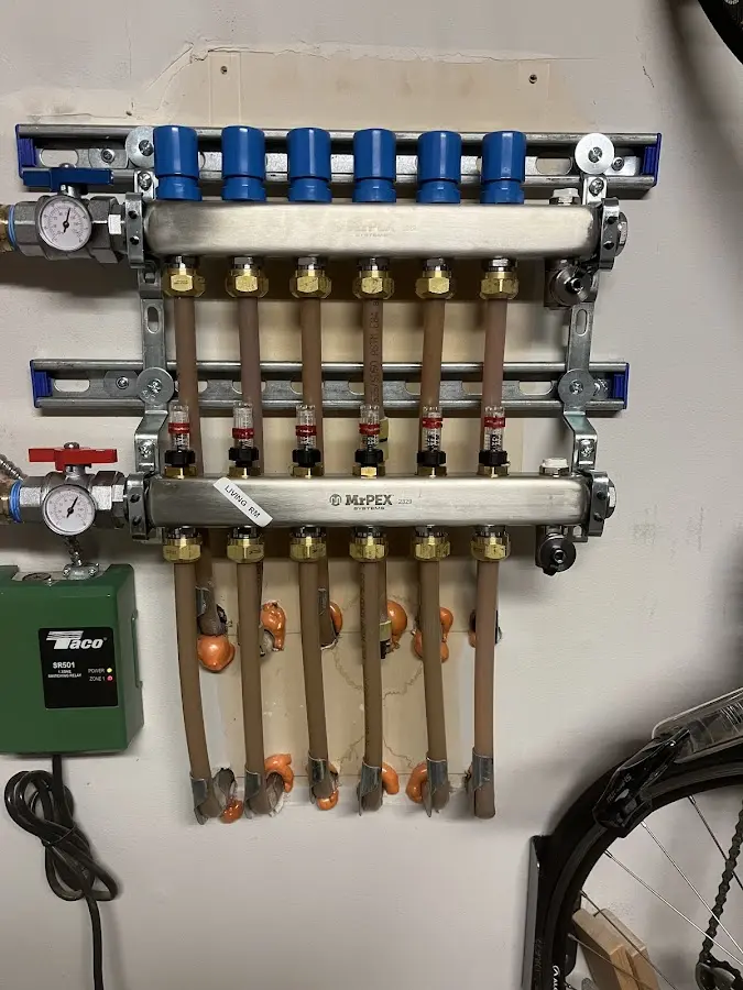 Plumber performing Gas Leak Detection at a residential property in Montville